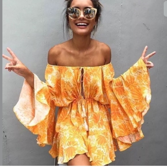 Showpo. Pants - SHOWPO Orange Yellow Flare Sleeve Romper